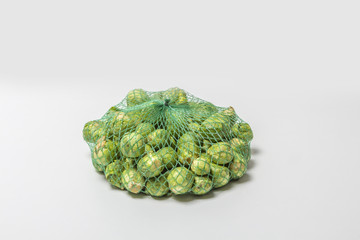 Brussels sprouts in a net