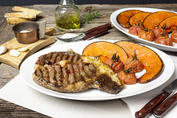Ribeye steak with baked pumpkin