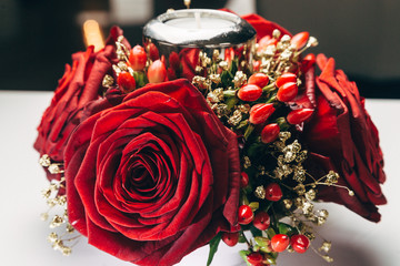 Christmas arrangement of red roses