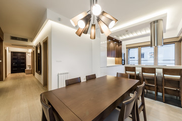 Dining room interior in modern bright apartment