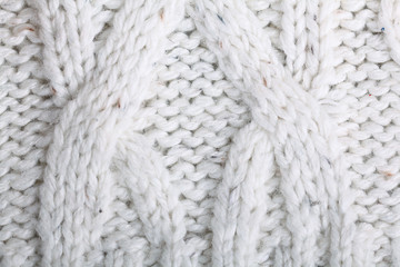 texture of white wool knit sweater homemade