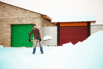 Shoveling snow.