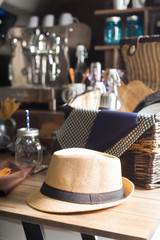 Hat resting on a wooden table.