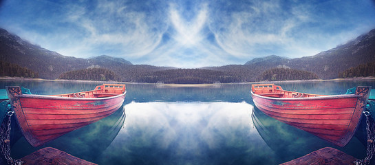 bateau en bois sur un lac de montagne paysage montagne ciel