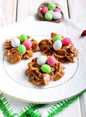 Chocolate and cornflakes nests with candy eggs