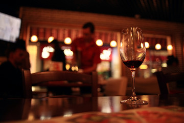 glass with red wine, tasting, restaurant