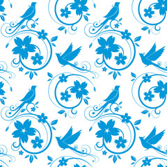 Blue birds and blossoms seamless pattern