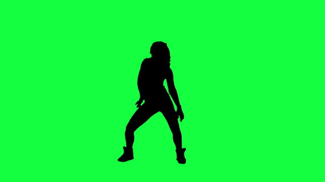 Dancer's silhouette against a green background