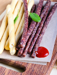 Smoked thin sausages