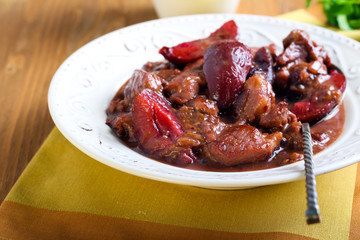 Pork stew with plums