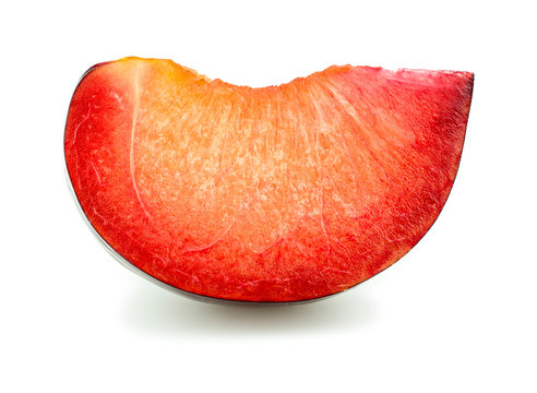 Extreme macro closeup of slice of juicy delicious ripe plum