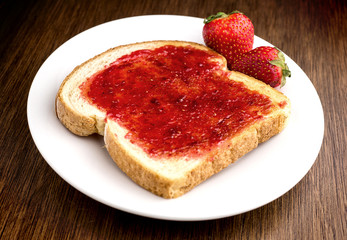 Strawberry jam on toast