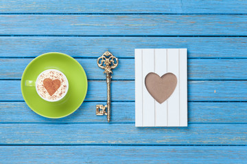 Cappuccino, key and photo frame