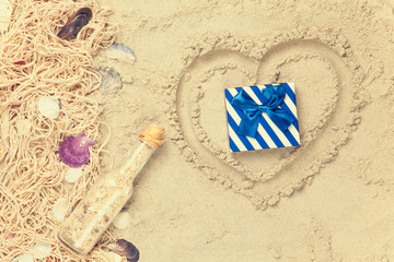 Net, shells with bottle and gift box