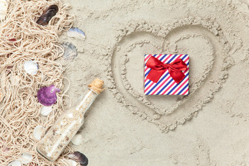 Net, shells with bottle and gift box