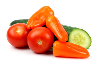 cucumber tomatoes and peppers on a white background