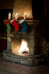 Christmas stocking on fireplace background. Chimney place.