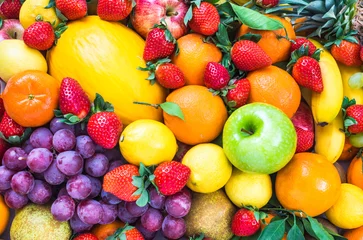 Photo sur Aluminium Fruits Fruits frais mélangés. Fond de fruits. Suivre un régime, une alimentation saine.