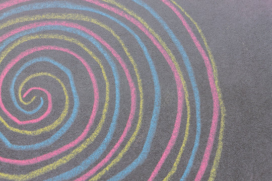 Chalk with spin cycle on chalkboard background