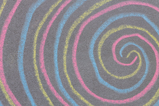 Chalk with spin cycle on chalkboard background