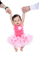 A Asian baby and family on a studio white background