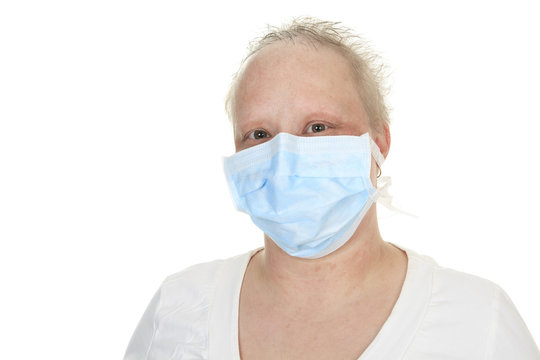 A Chemotherapy Woman Wearing A Medical Mask.