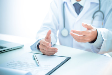 Close-up of a medical worker with laptop