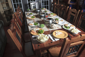 A Fondue Dinner  with Table and Equipement.