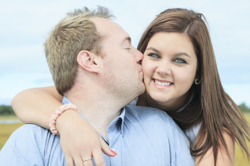 Young happy couple on summer season