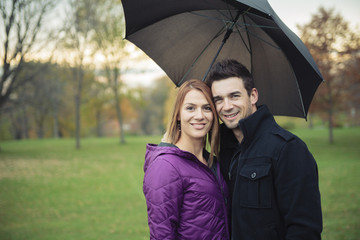 A Young happy couple in autumn season