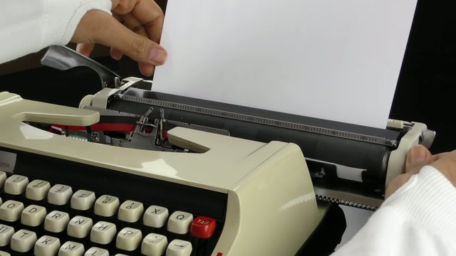Adding Paper to Typewriter