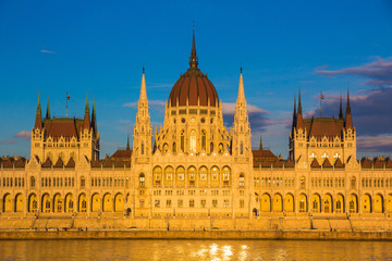 Fototapeta na wymiar Budapest Parliament Building illuminated before sunset, Hungary