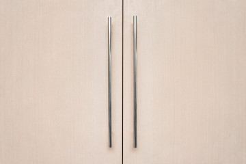 light brown doors with metal handles