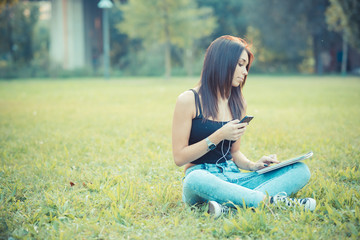 young beautiful brunette straight hair woman using tablet and sm