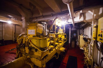 Engine room on a cargo boat ship, engine room on an oil platform