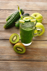 Green fresh healthy juice with fruits and vegetables