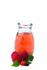 raspberry juice drink isolated ladybug