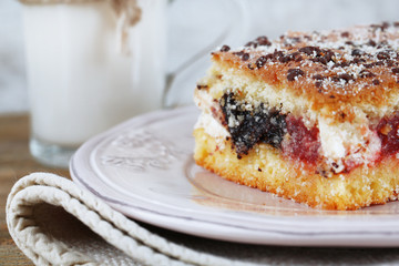 Homemade pie with jam and glass of milk