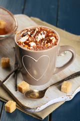Cup of hot coffee with marshmallow