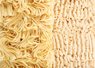 Different dry instant noodles close-up background