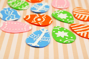 Felt Easter eggs on craft paper background