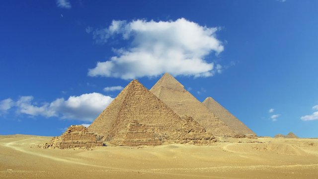 Timelapse with clouds over great pyramids in Egypt  4k