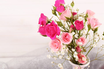 Beautiful roses in vase, close-up