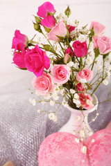Beautiful roses in vase, close-up