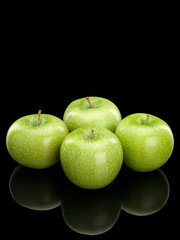 Four green apples