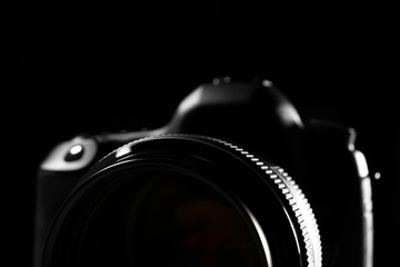 Digital camera on dark background