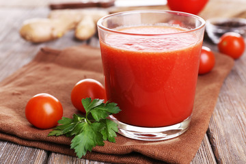 Glass of tomato juice with cherry tomatoes