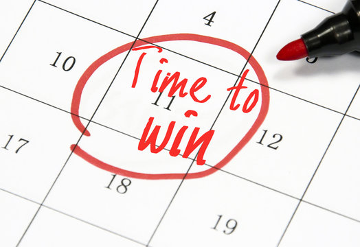 time to win text write on calendar
