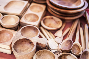 wooden pots, plates and eating utensils