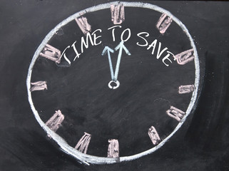 time to save sign on blackboard
